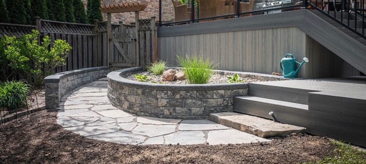 Raised planter wall and stonework detail by Brothers Landscaping